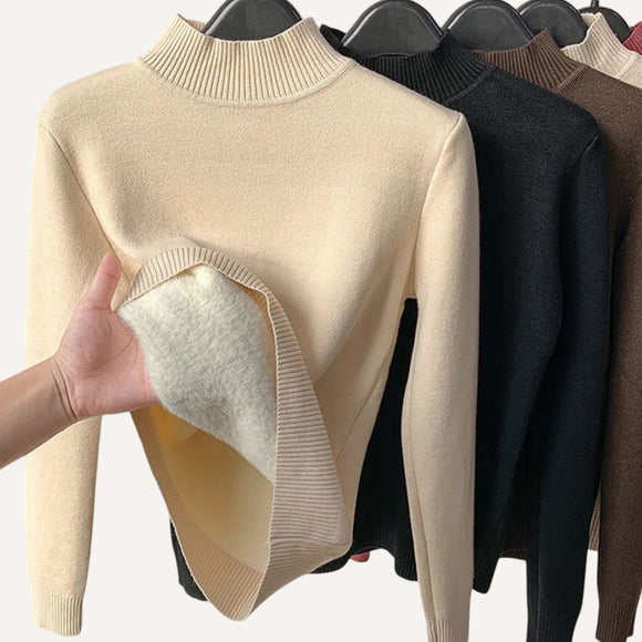 Suéter de cuello alto de lana gruesa para mujer.