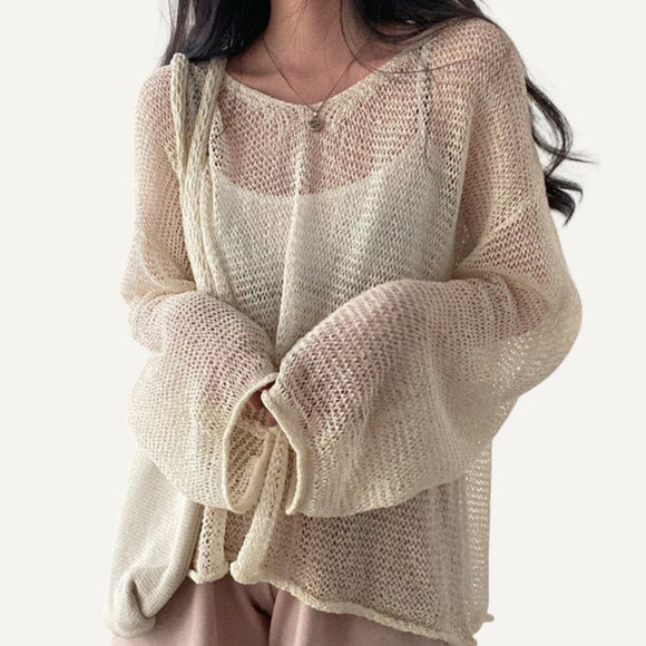 Blusa holgada, de manga larga para mujer.