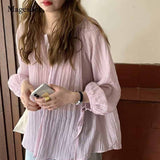 Blusa de chifón de manga larga con cuello redondo. Camisa holgada de mujer
