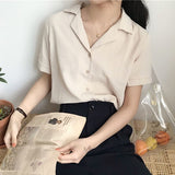 Blusa de manga corta, cuello en V. Camisa para mujer informal.
