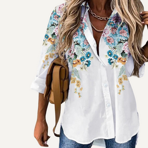 Camisa manga larga floreada de mujer. Blusa con estampas.
