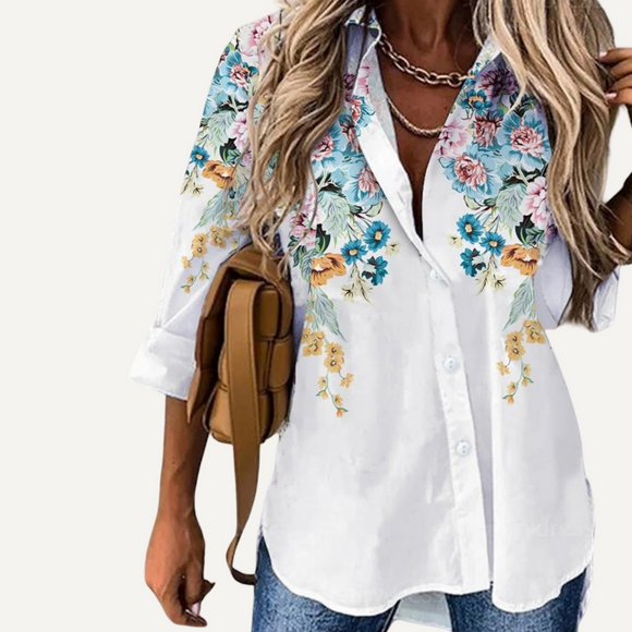 Camisa manga larga floreada de mujer. Blusa con estampas.